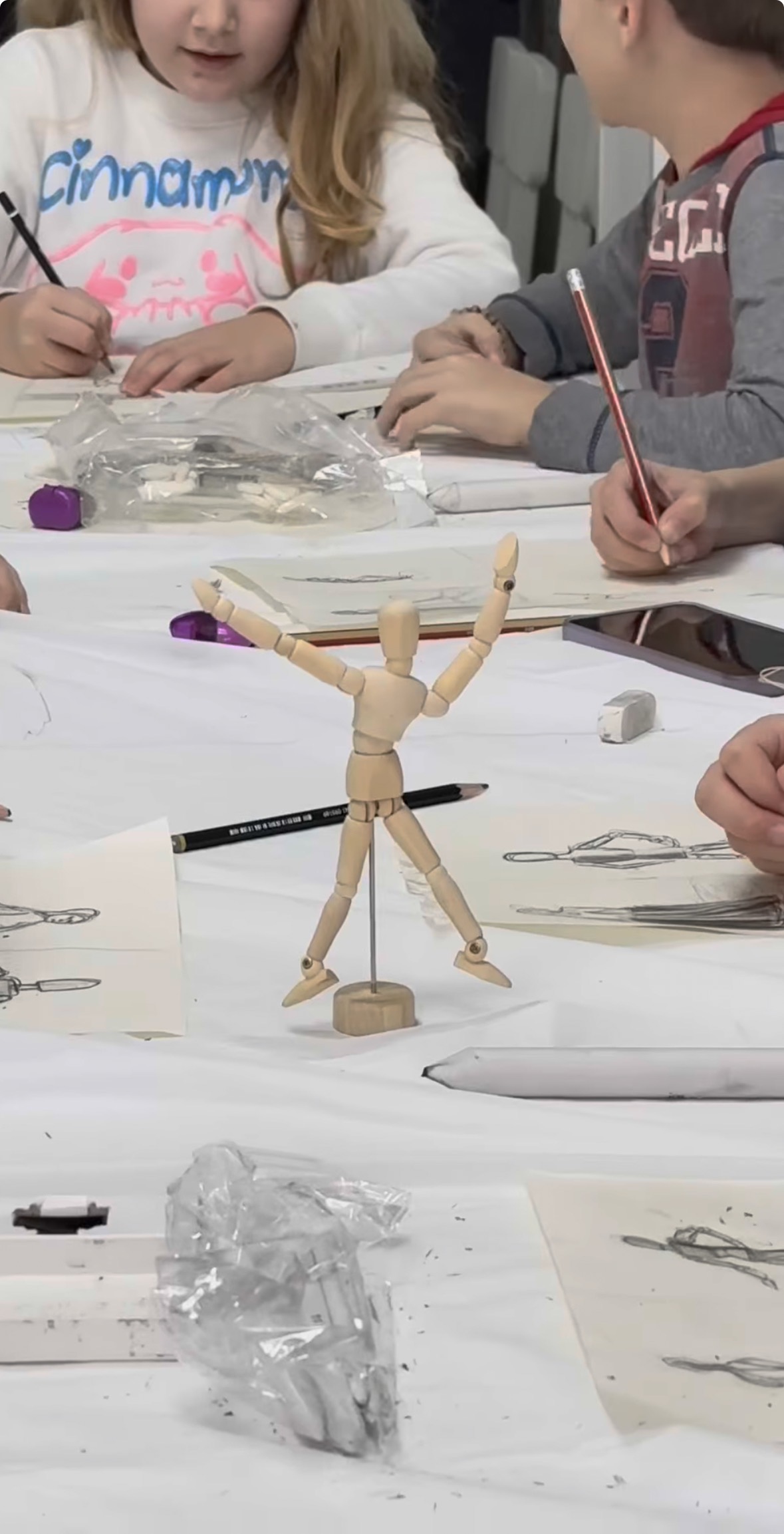 Wooden mannequin posed for figure study